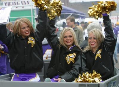 Here is a photo of some of the Viking Football Cheerleaders! They were riding through the tailgating lots hawking some photos of themselves.  Shameless self-promotion; can you blame them?