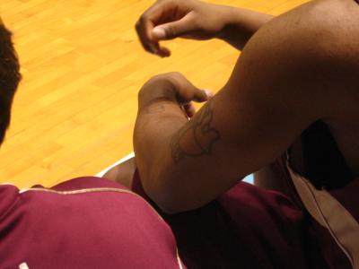 Alexander Johnson's lame Tru Ballet tatoo.  What a loser.
