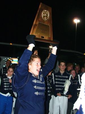 State Jessica lifts the State trophy.JPG