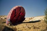 Men deflating the balloon