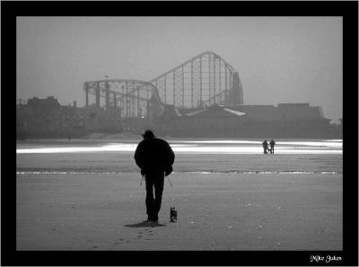 Walking the dog  (With couple in background)
