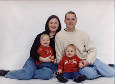 Mommy holding Rory and Daddy holding Reagan