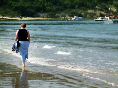 Carole walking in the shallows, Isle of Wight