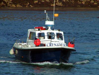 Our boat coming to fetch us at St. Agnes