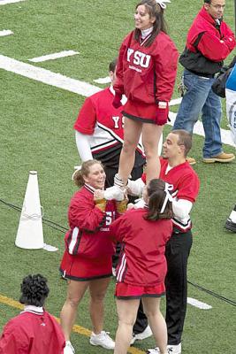 Youngstown State Univeristy Cheer Leaders Braving the Cold Weather and Cheering their team on.