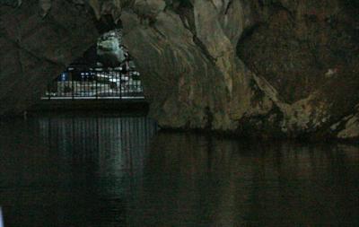 View of front entrance from boat in cave