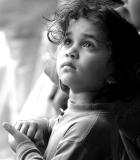 Child watching busker