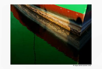 Boat on the water  by Miguel Garcia-Guzman