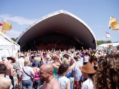 Getting the Village Stage crowd dancing