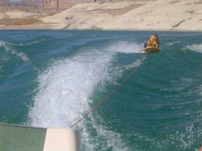 u35/world_of_sarah/medium/23071681.022NavajoGlenCanyonEastonsTimBoogieBoardingatLakePowellweb.jpg