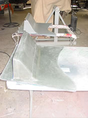 The oil cooler duct set on the bottom of the hood