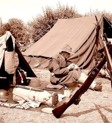 This picture placed 27th out of 250 at DPChallenge.com It was the Nostalgia Challenge. Its called Down Time Thats what we call free time in the Army!
