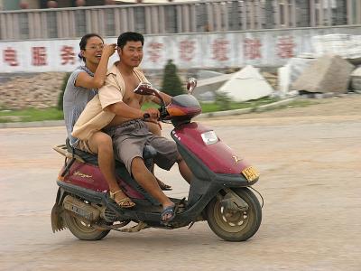 Couple on scooter in Haiyang