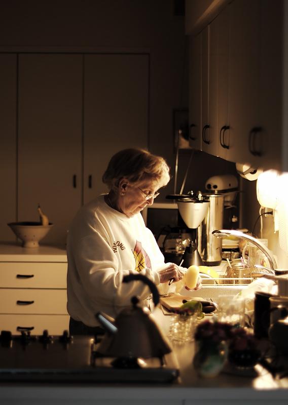 Mom peeling an onion