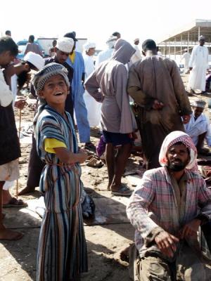 Omani boy, Barka fish market