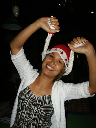 Joy full of Christmas cheer behind the bar