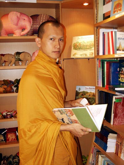 Monk browsing in a book store