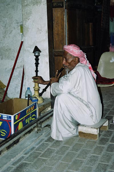 Man smoking a shisha pipe, Sharjah