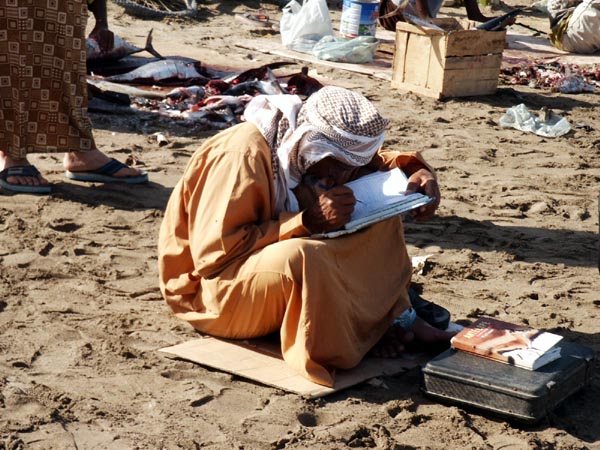 Keeping the books, Barka fish market