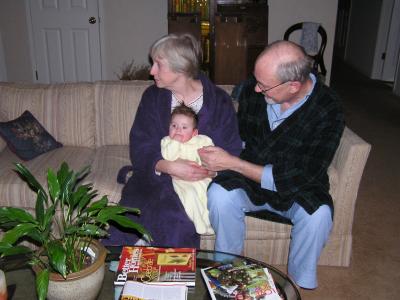 Carolyn & Jerry cuddling with Brynn