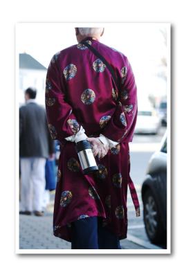 ....a cuppa'joe in tow behind a snazzy smoking jacket;