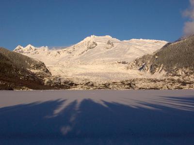 Mendenhall Glacier - Cross Country Skiiers in right distance on the lake.