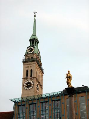 The tower of Peterskirche and the Column of the Virgiin