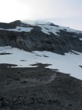 Trail Snaking Along Rocks and Snow