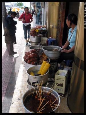 Roasted pork legs and steamed corns