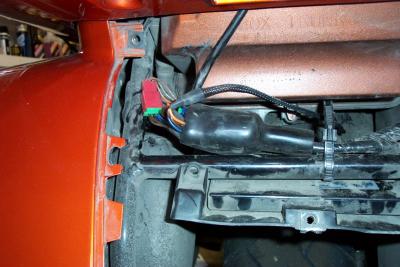 Now you have to stuff it all back into the boot. One connector wouldn't fit