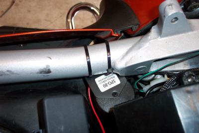 I used two zip ties to attach it to the frame rail