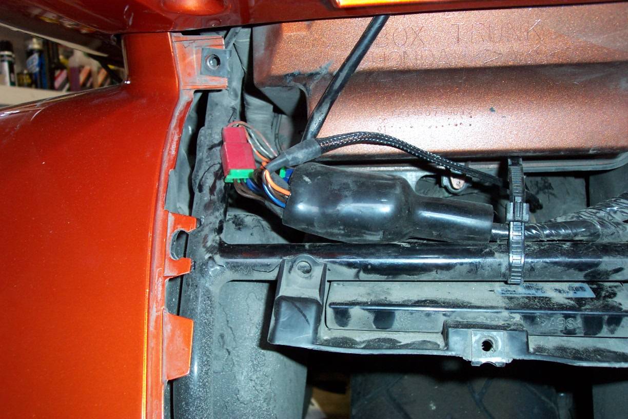 Now you have to stuff it all back into the boot.  One connector wouldnt fit