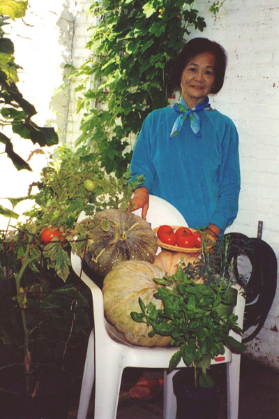 My wife in her vegetable garden