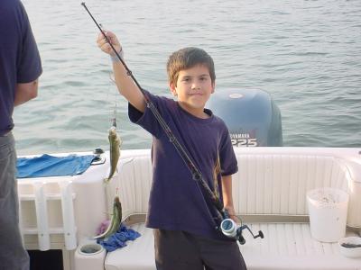 8/5/04 Falgout Charter - Jeff shows off with doubles. Falgout family caught over 50 perch