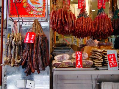 Meat Hanging in Front of Restaurant (Note the Duck Necks/Heads on Left)
