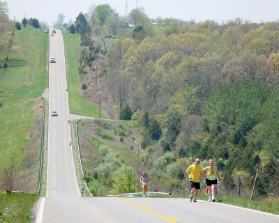 Jeff running with Peggy on 11th leg