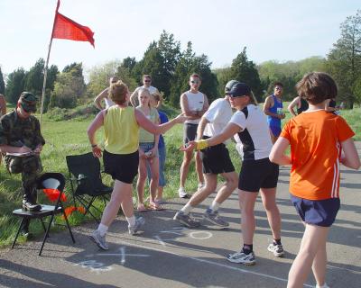 Peggy handing off to Greg at 19th exchange