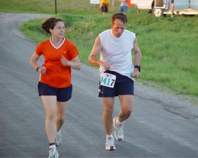 Christine running w/Garry at end of 23rd leg