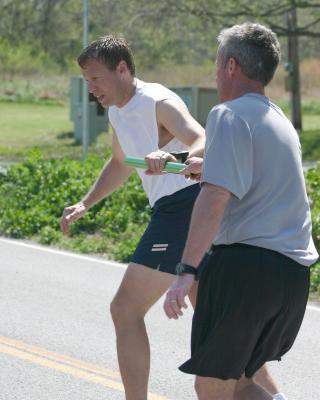 Dave handing off to Garry at 14th exchange