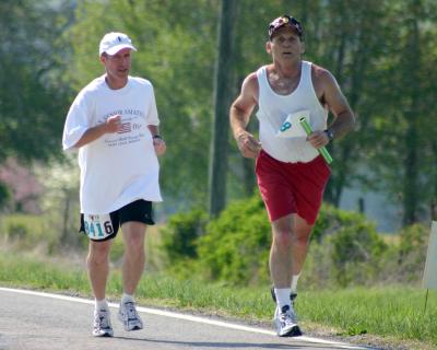 Dave running with Terry at end of 16th leg