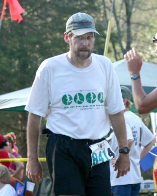 Greg not smiling after 20th leg