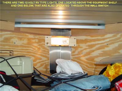 THE 12 VOLT LIGHT SHOWN HERE IS LOCATED ABOVE THE ACCESSORY SHELF AND THERE IS ANOTHER ONE BELOW THE SHELF