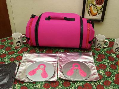 Rare pink carrying bag and mousepads