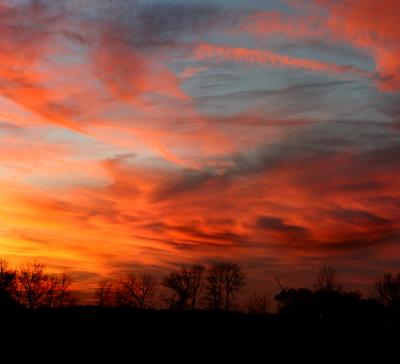 Indiana Sunset
I shot this at my sister's house in Pendleton, Indiana.  It is two shots stitched together in Panorama Factory.  There are almost no changes to color/saturation/contrast/etc.  Nearly straight out of the camera.  I did do a minor levels adjustment, and that was it!