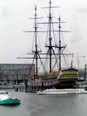 Replica of de Amsterdam is moored near the museum