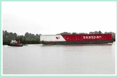 Small tug, big barge.