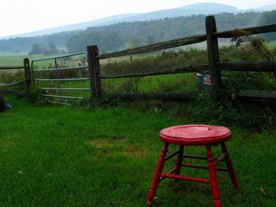 Red stool in rain