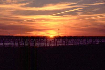 Fall Sunset over Alantic Beach pier.  Minolta 600si 24-80 lens,Provia100F