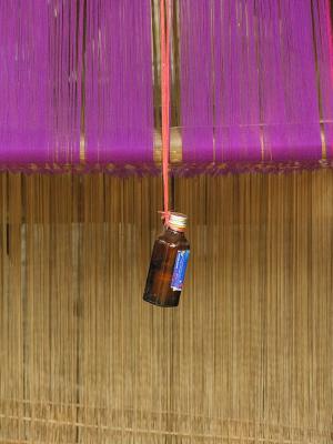 Bottle as Weight - Hmong Village