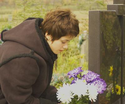 lesya at her grandfather's grave